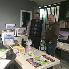 Cesar and Marc and the silent auction items